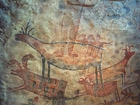 Foto's muurschildering in grot