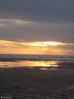 Foto's zonsondergang strand 
