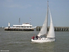 Foto staketsel met zeilboot