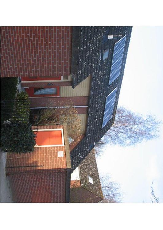 zonne-energie - Zonnepanelen op een dak