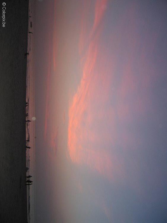 zonsondergang strand