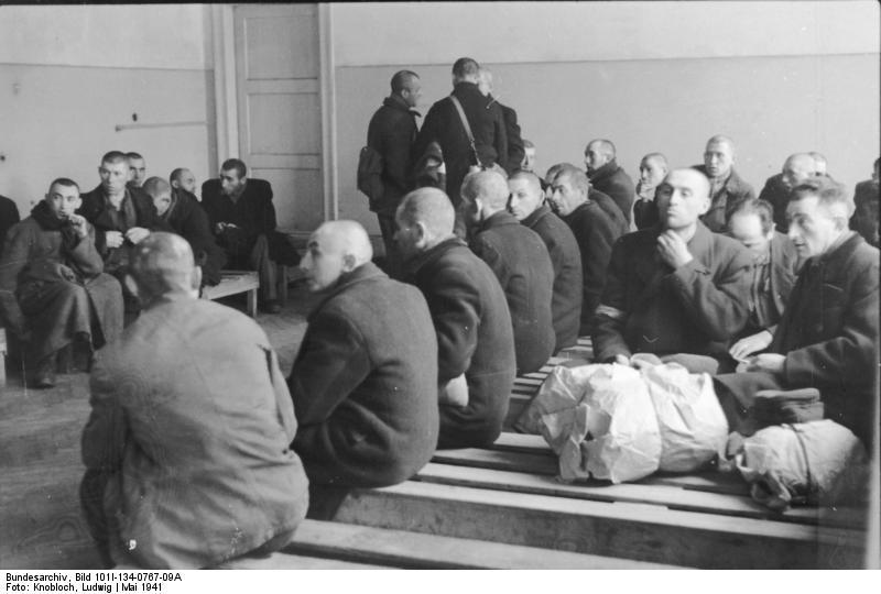 polen - ghetto warschau - mannen wachten Foto polen - ghetto warschau - mannen wachten